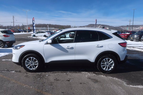 right side view of a white 2021 ford escape